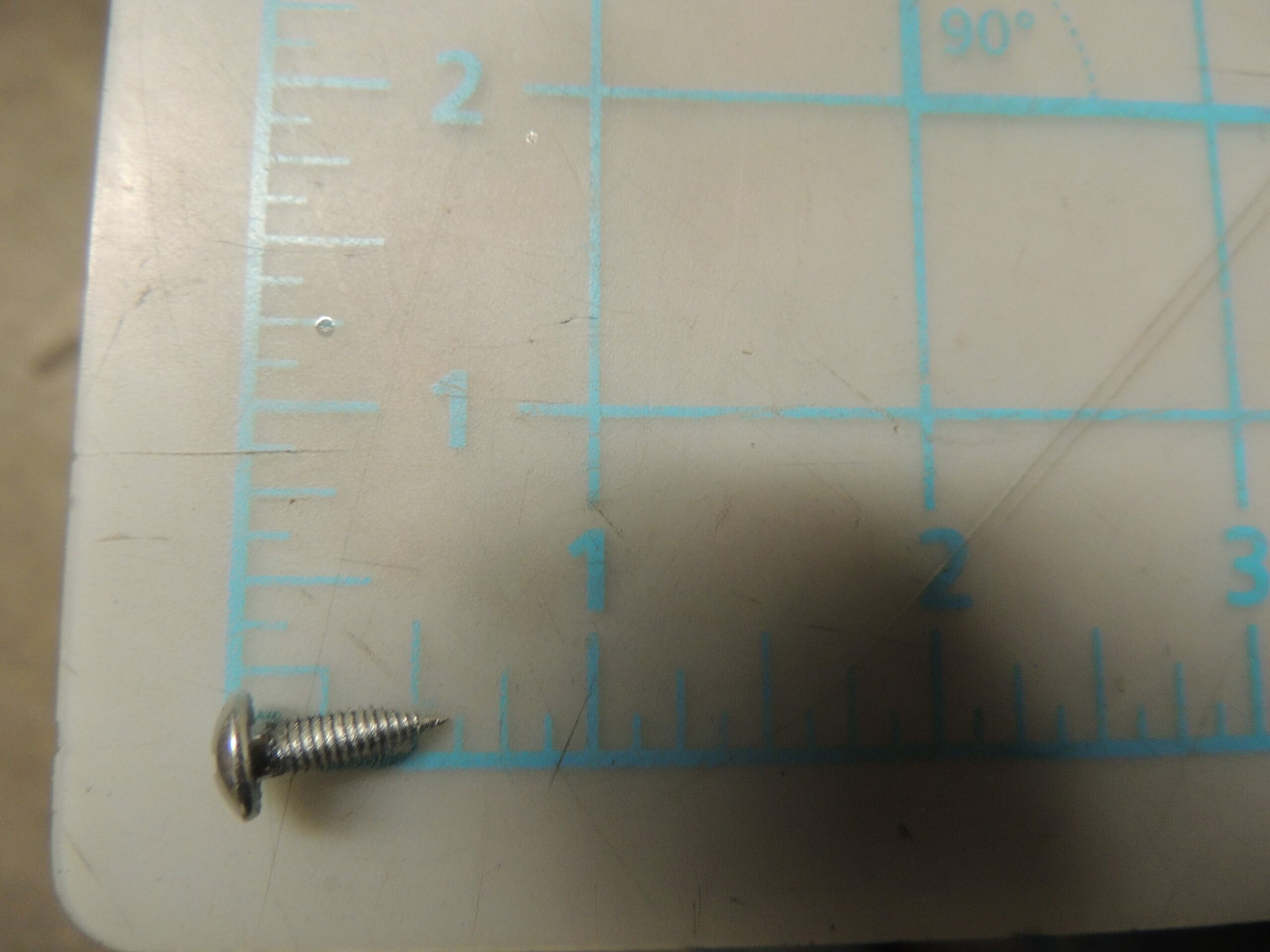 1.05.03.04.012 Triangle locking Screw 4X12