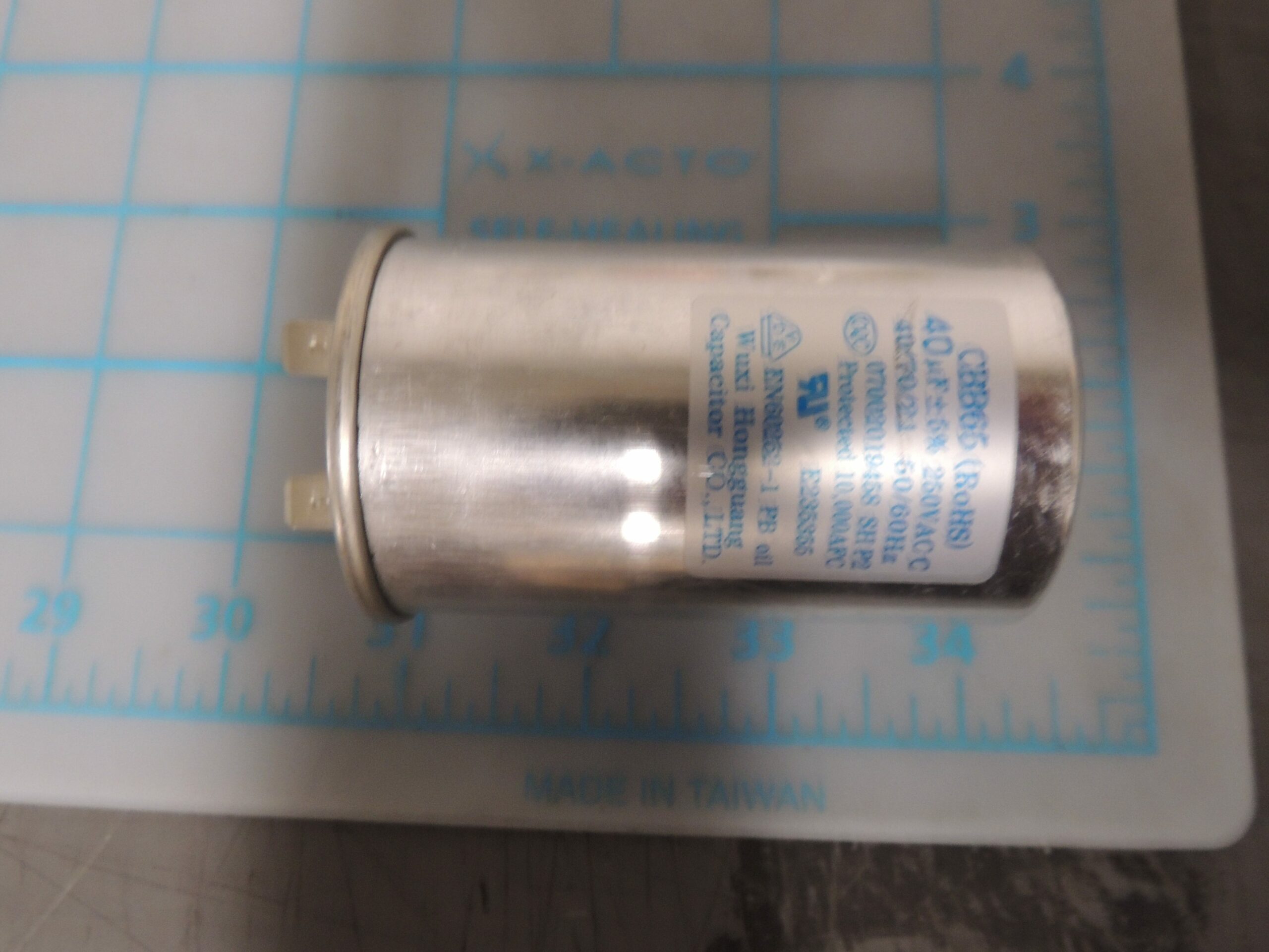 17400103000060 Capacitor of compressor